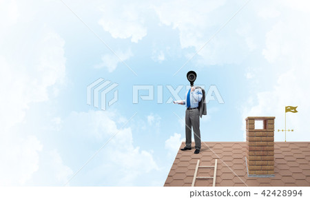 Concept of home security and privacy protection with camera headed man 42428994