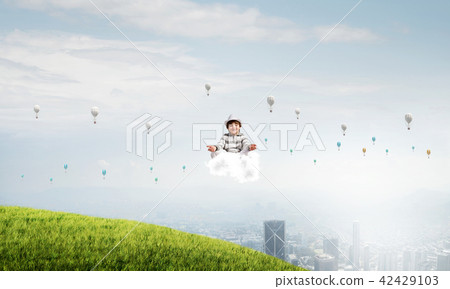 Young boy keeping mind conscious. Young boy keeping mind conscious. 42429103