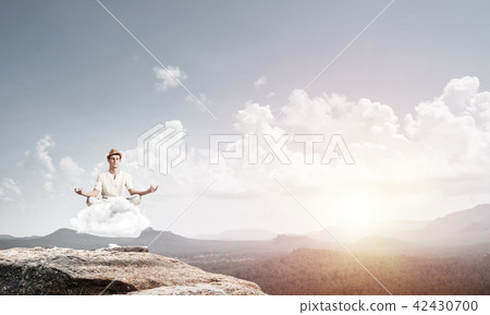 Young man keeping mind conscious. 42430700