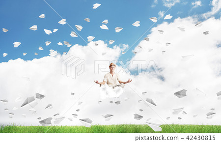 Young man keeping mind conscious. Young man keeping mind conscious. 42430815