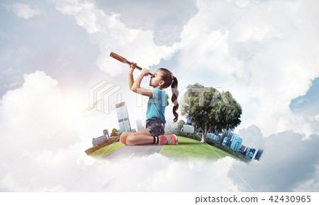 Concept of careless happy childhood with girl looking in future 42430965