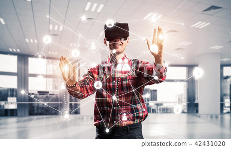 Guy wearing checked shirt and virtual mask reaching hand to touch screen Guy wearing checked shirt and virtual mask reaching hand to touch screen 42431020
