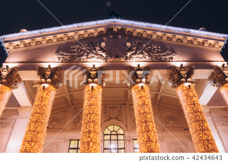 Beautiful theater backlit in the evening. Facade Beautiful theater backlit in the evening. Facade 42434643