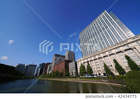 Looking over Japanese office buildings in Tokyo cityscape Hibiya street 42434773