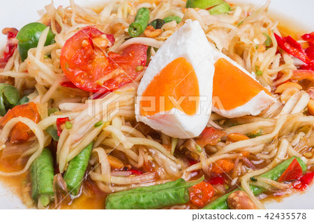 Papaya salad on top with salted egg "Somtum" in Th Papaya salad on top with salted egg "Somtum" in Th 42435578