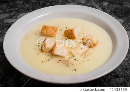 Mushroom cream soup with croutons and spices 42435589