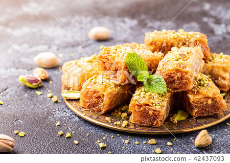 Homemade baklava with nuts and honey. Homemade baklava with nuts and honey. 42437093