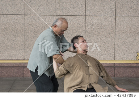 Master and apprentice martial arts teaching exercises 42437899