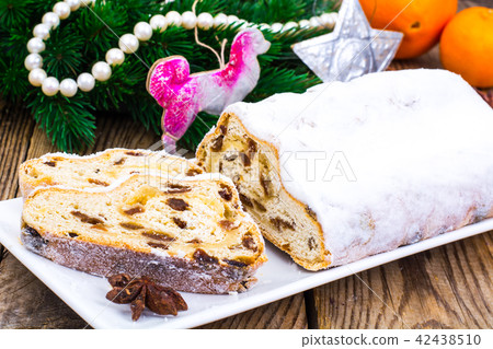 Christmas shtollen with raisins in sugar glaze 42438510