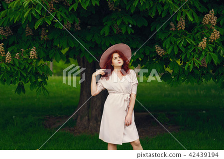 pretty girl in a park 42439194