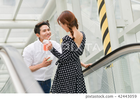 Escalators, Shopping, Couples, Dating, Travel, Sightseeing Escalators, Shopping, Couples, Dating, Travel, Sightseeing 42443059
