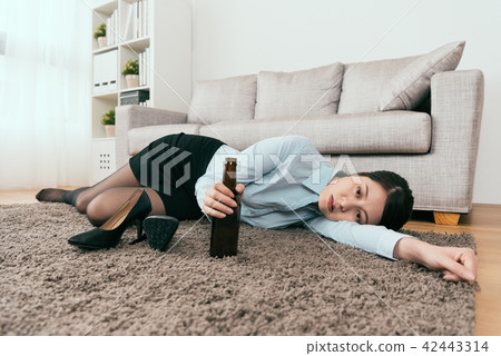 businesswoman manager is drunk from work 42443314