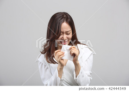 Oriental young woman, facial expressions of beauty, fine dust, smell, cold, stink, nose cold Oriental young woman, facial expressions of beauty, fine dust, smell, cold, stink, nose cold 42444349