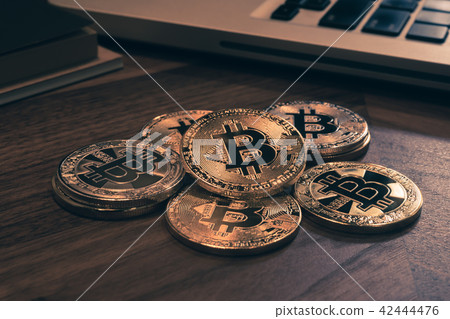 Cryptocurrency bitcoins, vintage retro style. 42444476