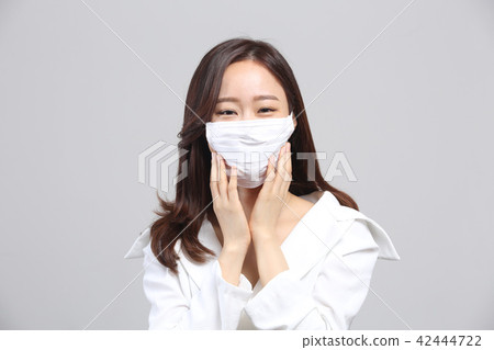 동양인 젊은여자, 미녀의 얼굴표정,미세먼지 ,냄새,악취,마스크,코감기 - 스톡사진 [42444722] - Pixta