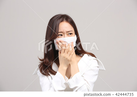 東方的年輕女子,美容面部表情,細塵,氣味,氣味,面膜,鼻子冷 東方的年輕女子,美容面部表情,細塵,氣味,氣味,面膜,鼻子冷 42444735