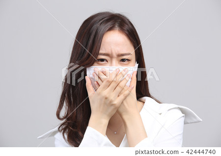 Oriental young woman, beauty facial expression, fine dust, smell, odor, mask, nose cold 42444740