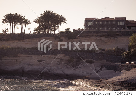 El Duque Castle on rocky coast, Tenerife, Spain. El Duque Castle on rocky coast, Tenerife, Spain. 42445175
