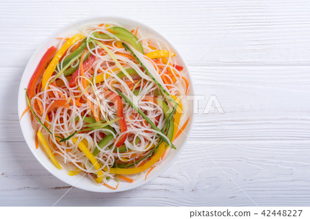 Salad from rice noodles with vegetables Salad from rice noodles with vegetables 42448227