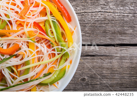 Salad from rice noodles with vegetables 42448235