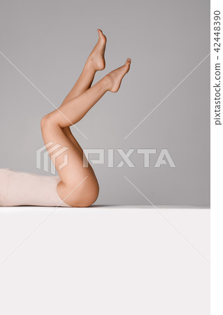 beautiful woman with slim legs beautiful woman with slim legs 42448390