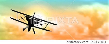 silhouette of biplane with clouds 42451831