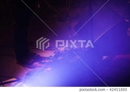Set of distortion effect pedals on a stage 42451893