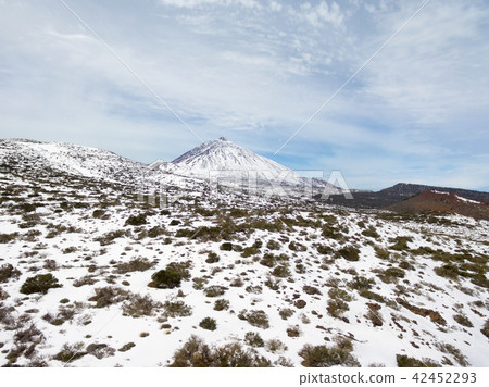 Drone aerial view of Teide volcano covered by snow Drone aerial view of Teide volcano covered by snow 42452293