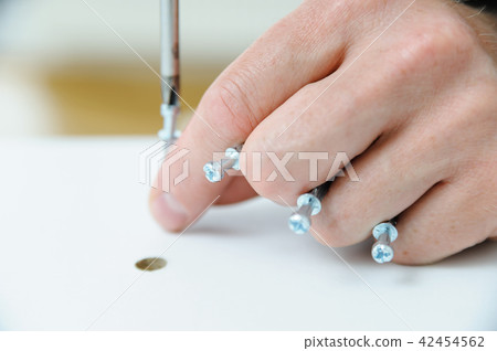 Furniture assembly at home. 42454562