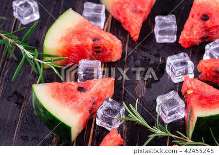 watermelon on wooden background 42455248
