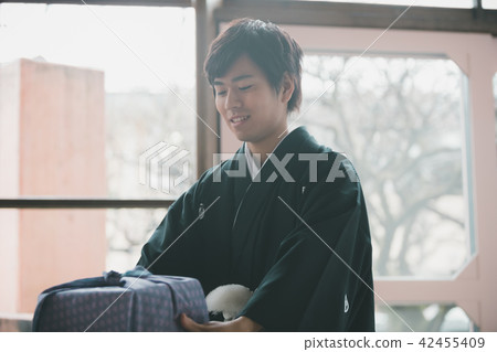 present, hakama with family crest, person 42455409
