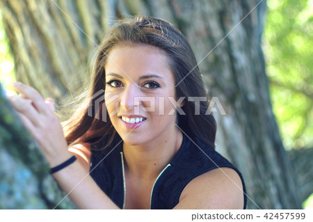 woman with glasses summer portrait vacations tree  42457599
