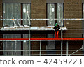 Construction worker on a scaffold 42459223