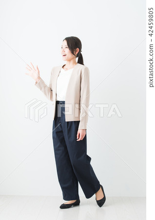 Full body of a business woman waving 42459805