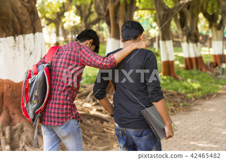 Two young students going to college, back pose 42465482