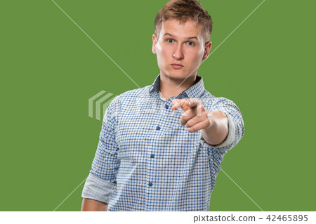 The overbearing businessman point you and want you, half length closeup portrait on green background The overbearing businessman point you and want you, half length closeup portrait on green background 42465895