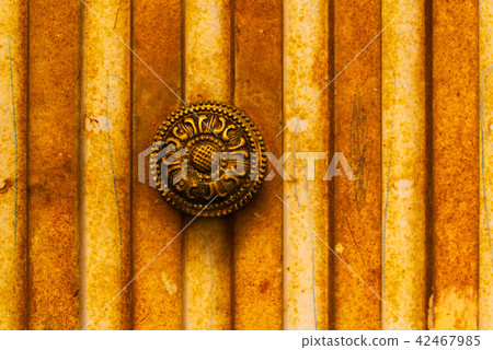 close up on a round door handle close up on a round door handle 42467985