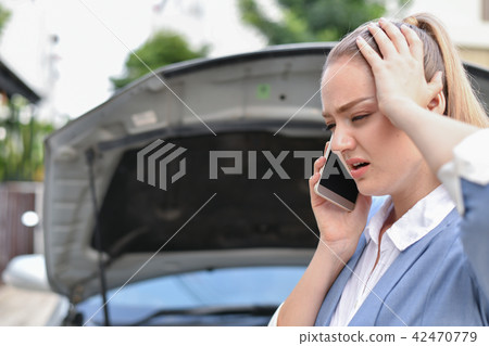 Driving Stress Concepts. Businesspeople are calling by insurance Driving Stress Concepts. Businesspeople are calling by insurance 42470779