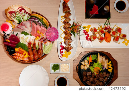 Japanese Unagi Maki roll, Sashimi, Beef Teppanyaki Japanese Unagi Maki roll, Sashimi, Beef Teppanyaki 42472292
