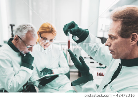 Famous chemist completing sensational discovery Famous chemist completing sensational discovery 42472316