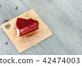 Delicious Red velvet slice cake on wood board 42474003