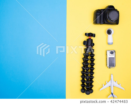 Flat lay top view of plane on yellow background Flat lay top view of plane on yellow background 42474483