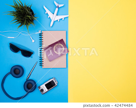 flat lay top view of traveler photographer accessories on yellow background flat lay top view of traveler photographer accessories on yellow background 42474484