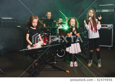 happy children singing and playing music happy children singing and playing music 42474956