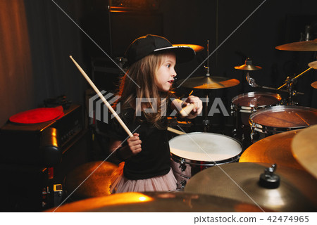 boy plays drums in recording studio boy plays drums in recording studio 42474965