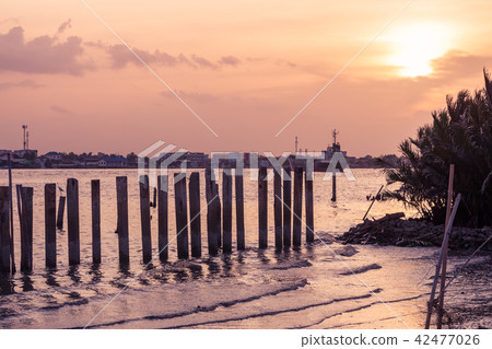 Monoliths built to protect the wave at dusk. Monoliths built to protect the wave at dusk. 42477026