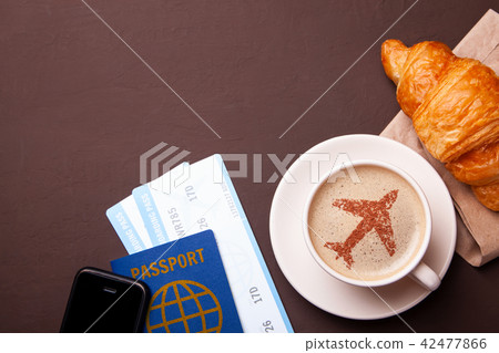 cup of coffee with an airplane on the foam cup of coffee with an airplane on the foam 42477866