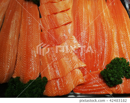 Salmon fillets frozen on ice Salmon fillets frozen on ice 42483182