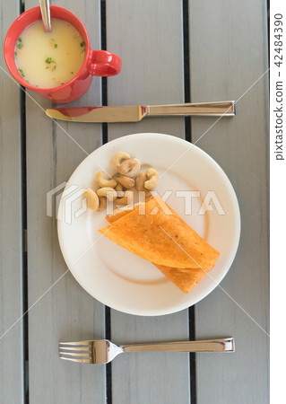 Finland breakfast (Tandoori chicken roll cashew nut soup) Finland breakfast (Tandoori chicken roll cashew nut soup) 42484390
