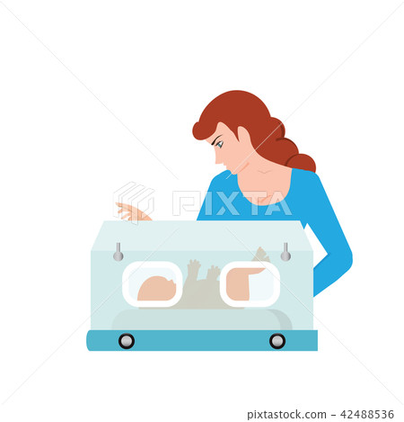 Mom or nurse look at baby in incubator. Mom or nurse look at baby in incubator. 42488536
